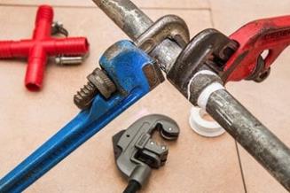 Plumbing tools to help with Merced pipe replacement.